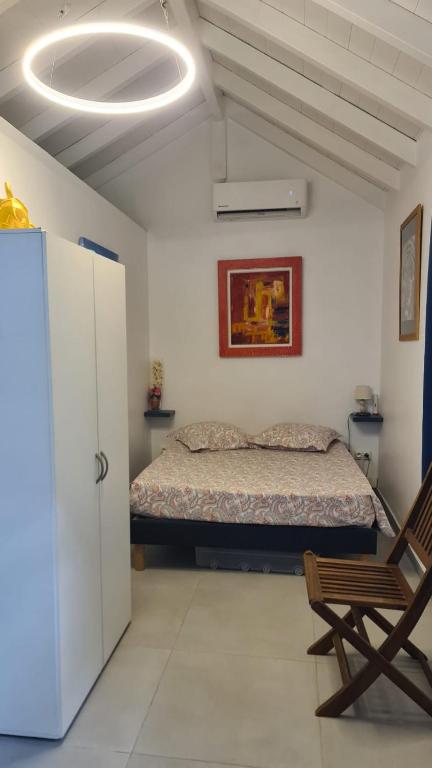 Postel nebo postele na pokoji v ubytování Studio à l'Anse Mitan