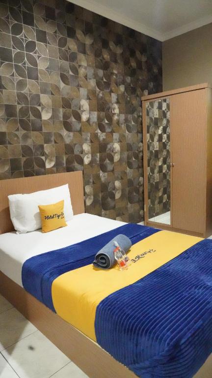 Kamar luas untuk satu orang dengan area yang nyaman leluasa
