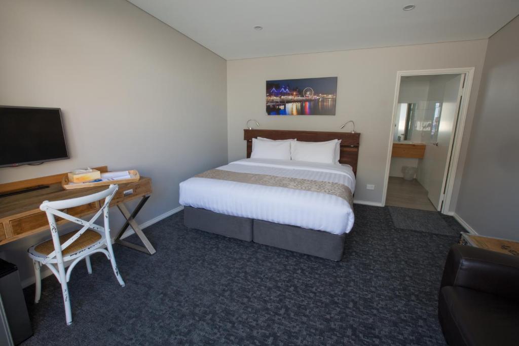 Postel nebo postele na pokoji v ubytování Fremantle Boutique Accommodation - Maand Up