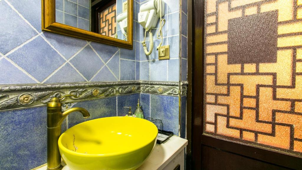 Koupelna v ubytování Pingyao Xinglongyi Inn