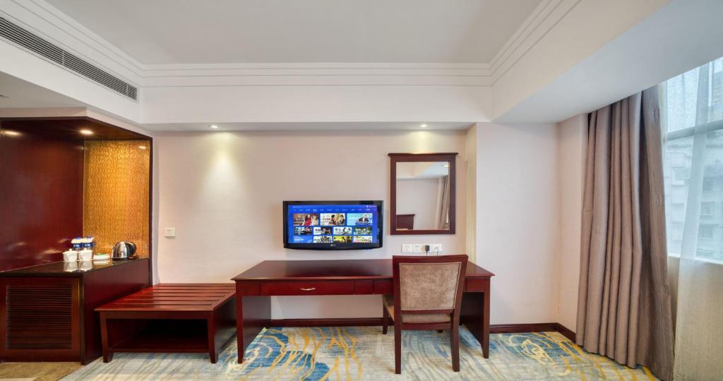 TV a/nebo společenská místnost v ubytování Sanyu Hotel