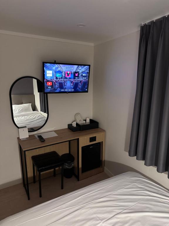 TV a/nebo společenská místnost v ubytování About Stay Dongdaemun