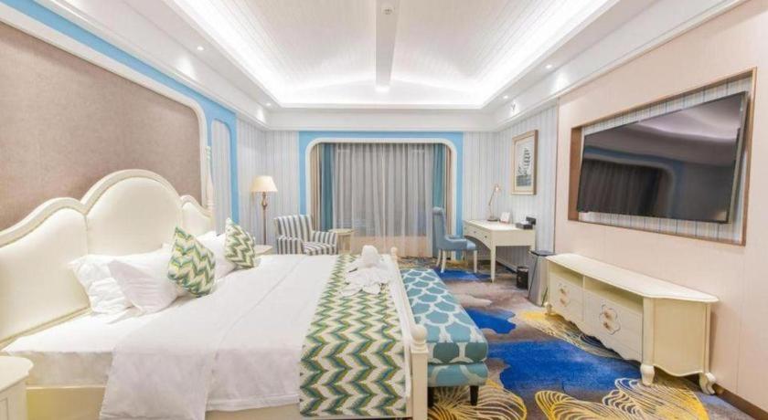 Postel nebo postele na pokoji v ubytování Enping Yucca Hotel