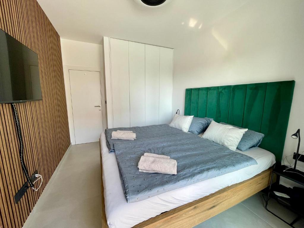 Postel nebo postele na pokoji v ubytování Apartament Slatine No 1