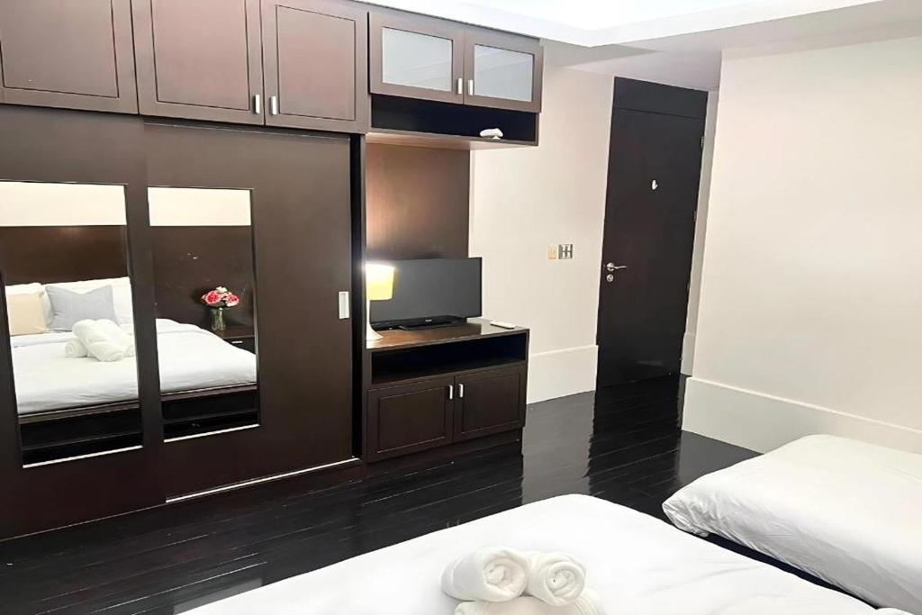 Postel nebo postele na pokoji v ubytování BM Pool Villa Pattaya