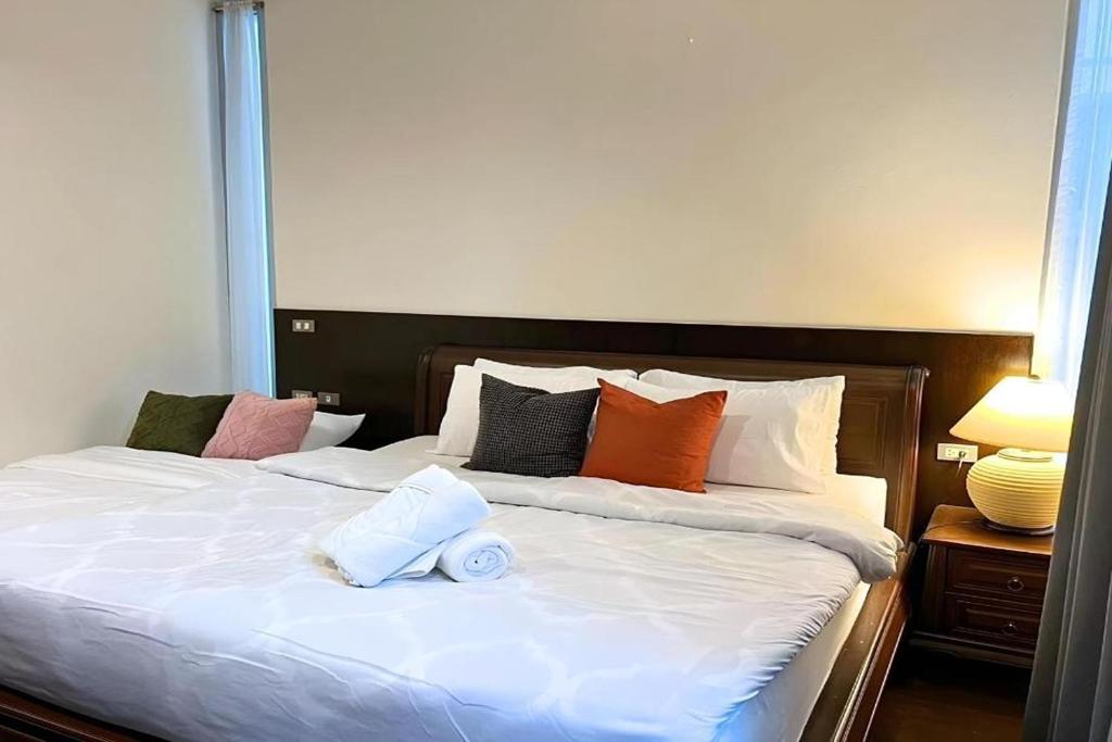 Postel nebo postele na pokoji v ubytování BM Pool Villa Pattaya