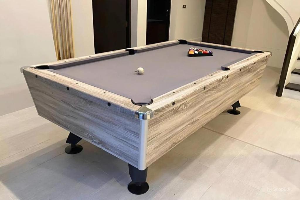 Biliár nebo kulečník v ubytování BM Pool Villa Pattaya