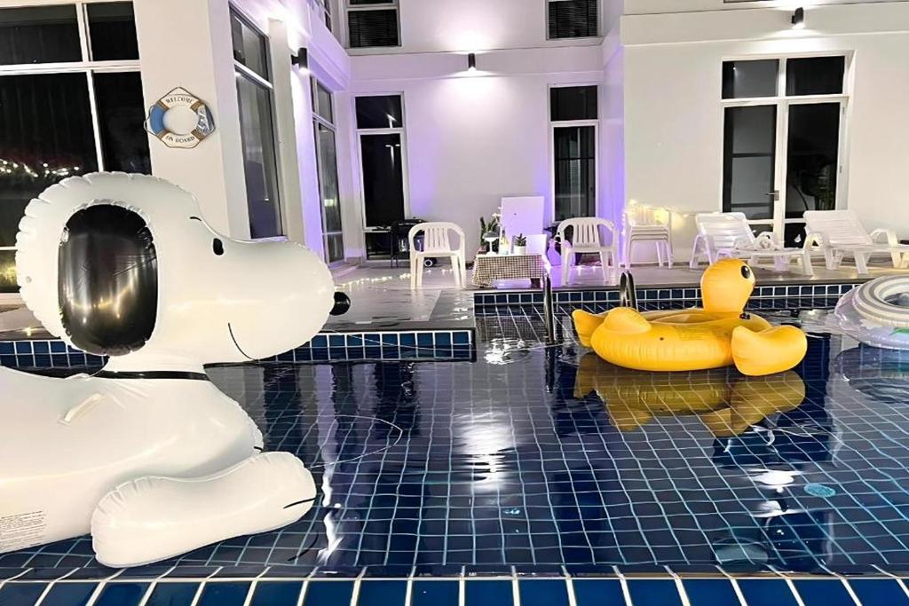 Posezení v ubytování BM Pool Villa Pattaya