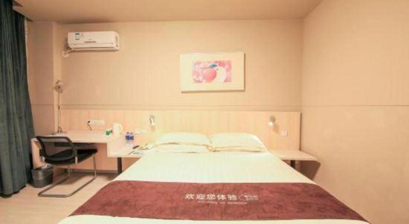 Voodi või voodid majutusasutuse JinJiang Inn Datong Pingchengqiao toas