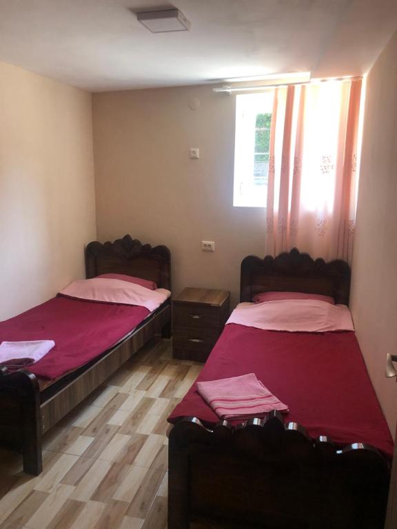 Postel nebo postele na pokoji v ubytování Guest House Coffee