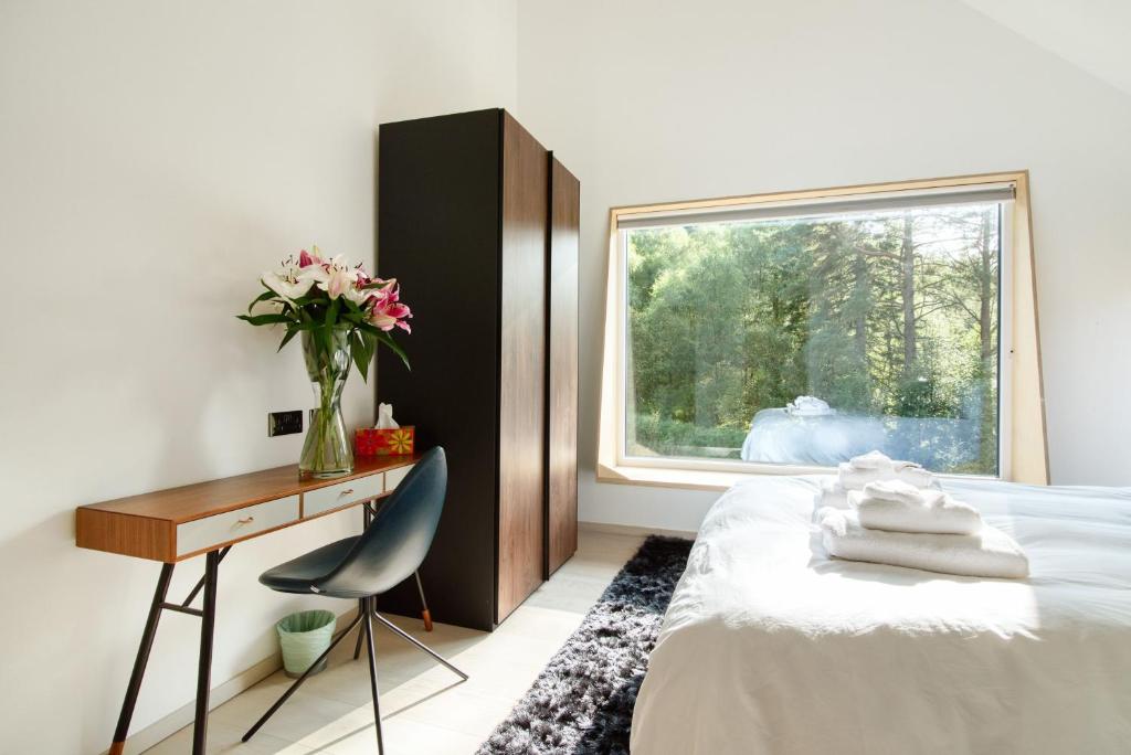 Postel nebo postele na pokoji v ubytování Stob Binnein Cottage