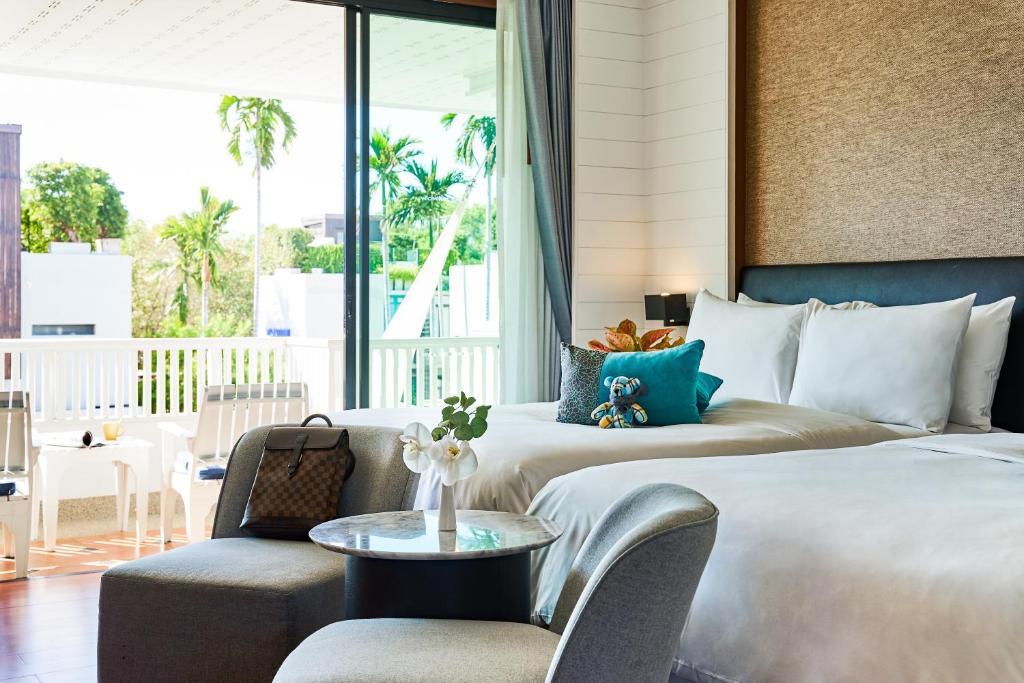 Postel nebo postele na pokoji v ubytování Loligo Resort Hua Hin