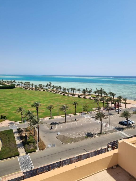 a view of the beach from the balcony of a resort at downtown star in King Abdullah Economic City