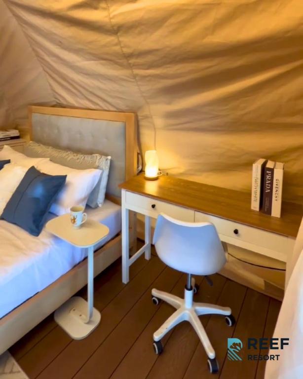 Postel nebo postele na pokoji v ubytování Reef Resort Unit C3