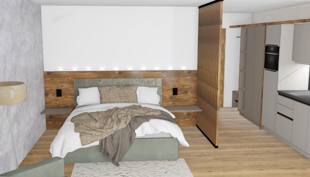 Postel nebo postele na pokoji v ubytování Kristall Apartments
