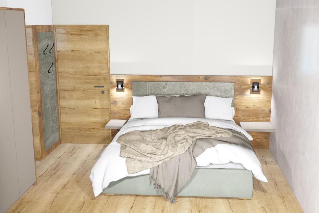 Postel nebo postele na pokoji v ubytování Kristall Apartments
