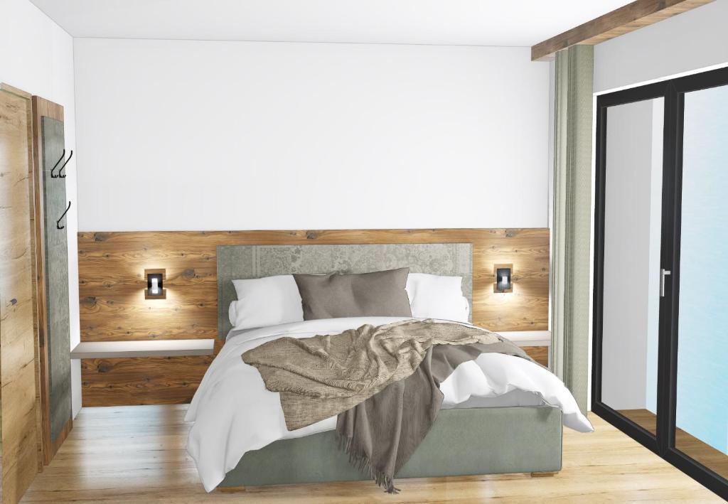 Postel nebo postele na pokoji v ubytování Kristall Apartments