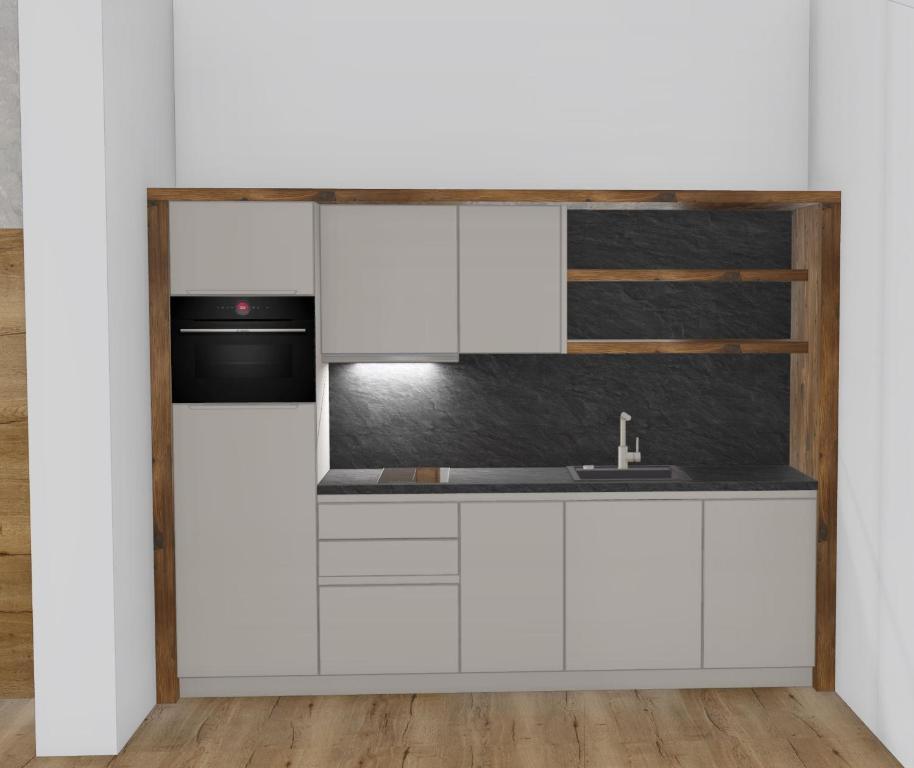 Kuchyň nebo kuchyňský kout v ubytování Kristall Apartments