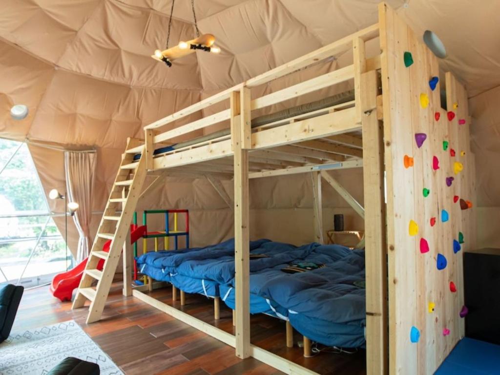 Postel nebo postele na pokoji v ubytování Nagano GLAMPINGBASE enCamp