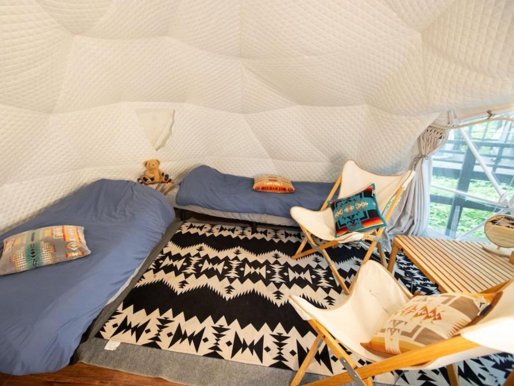 Posezení v ubytování Nagano GLAMPINGBASE enCamp