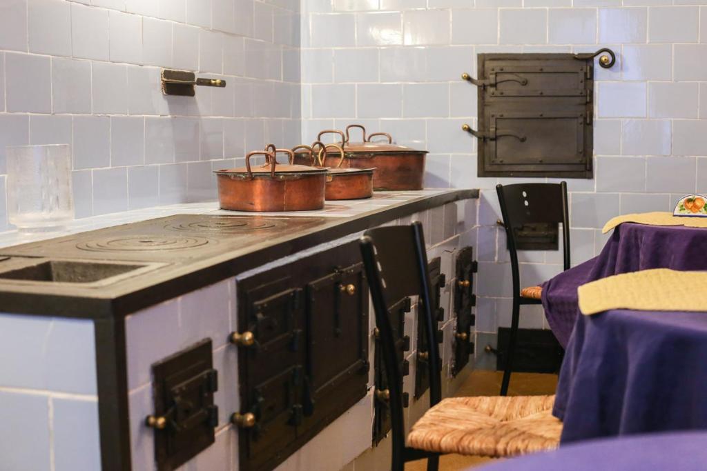 Kuchyň nebo kuchyňský kout v ubytování L'Orangerie di Cartia Giovanni