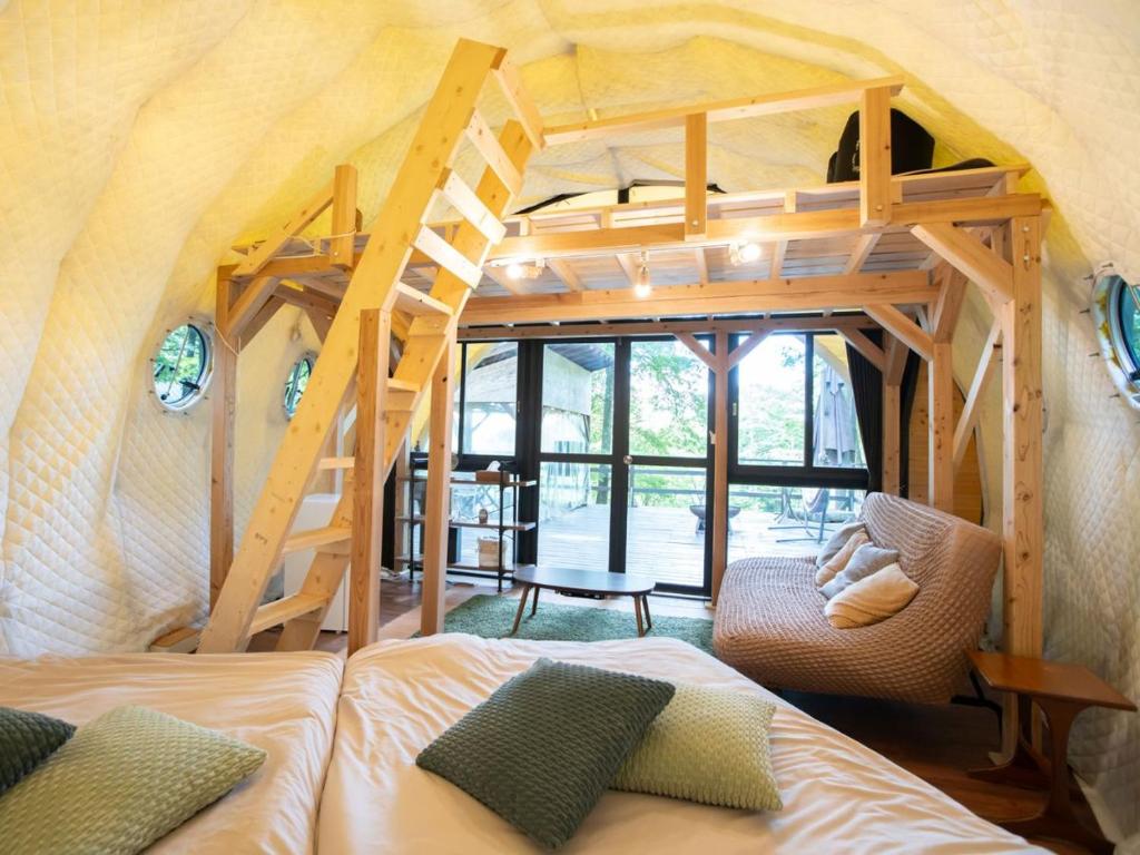 Postel nebo postele na pokoji v ubytování Nagano GLAMPINGBASE enCamp