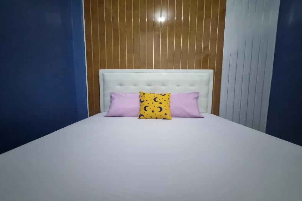 Postel nebo postele na pokoji v ubytování Ardafa Inn & Villa