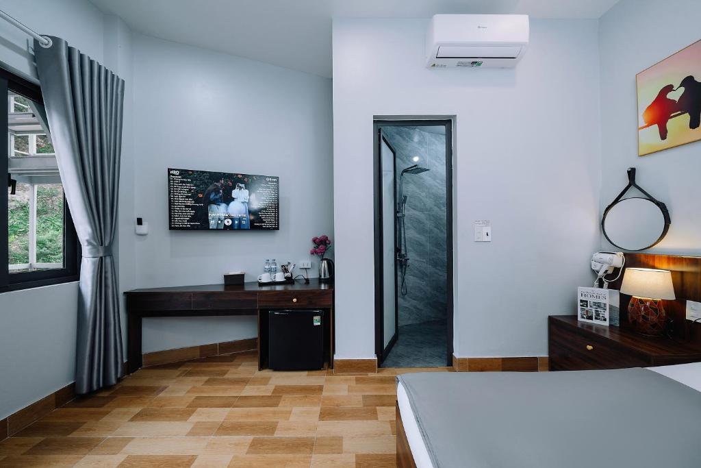 TV a/nebo společenská místnost v ubytování Napoli Hostel