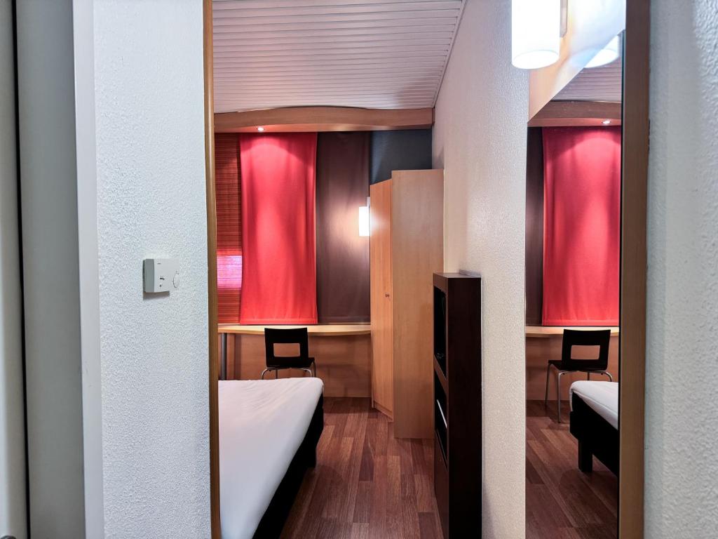A bed or beds in a room at a&o Hostel Milano Ca Granda