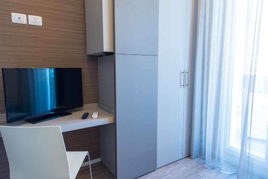 TV a/nebo společenská místnost v ubytování Hotel 2000