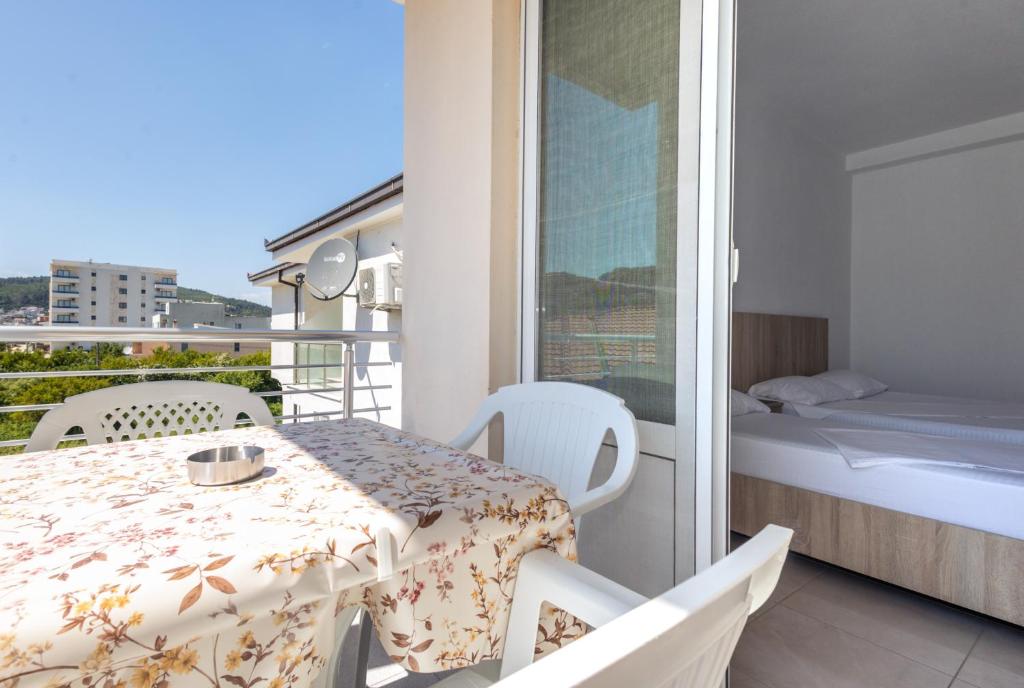 Postel nebo postele na pokoji v ubytování Dhoma Hotel