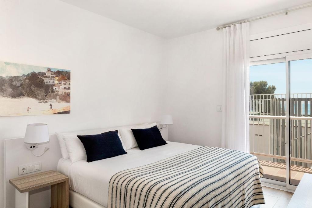 Postel nebo postele na pokoji v ubytování Hotel Terramar