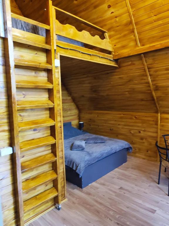 Postel nebo postele na pokoji v ubytování Călăreții lui Țepes