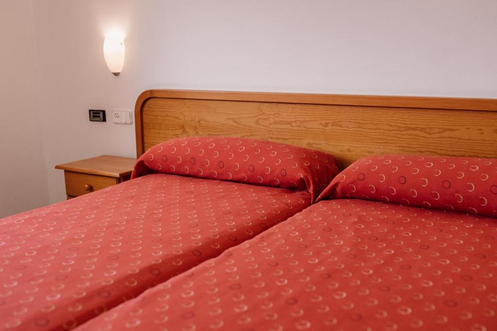 Postel nebo postele na pokoji v ubytování Hotel Lodomar Spa & Talasoterapia