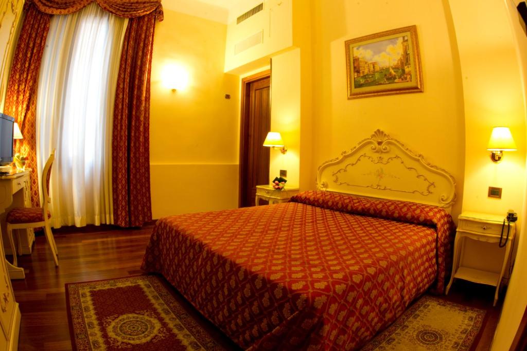 Postel nebo postele na pokoji v ubytování Locanda Poste Vecie