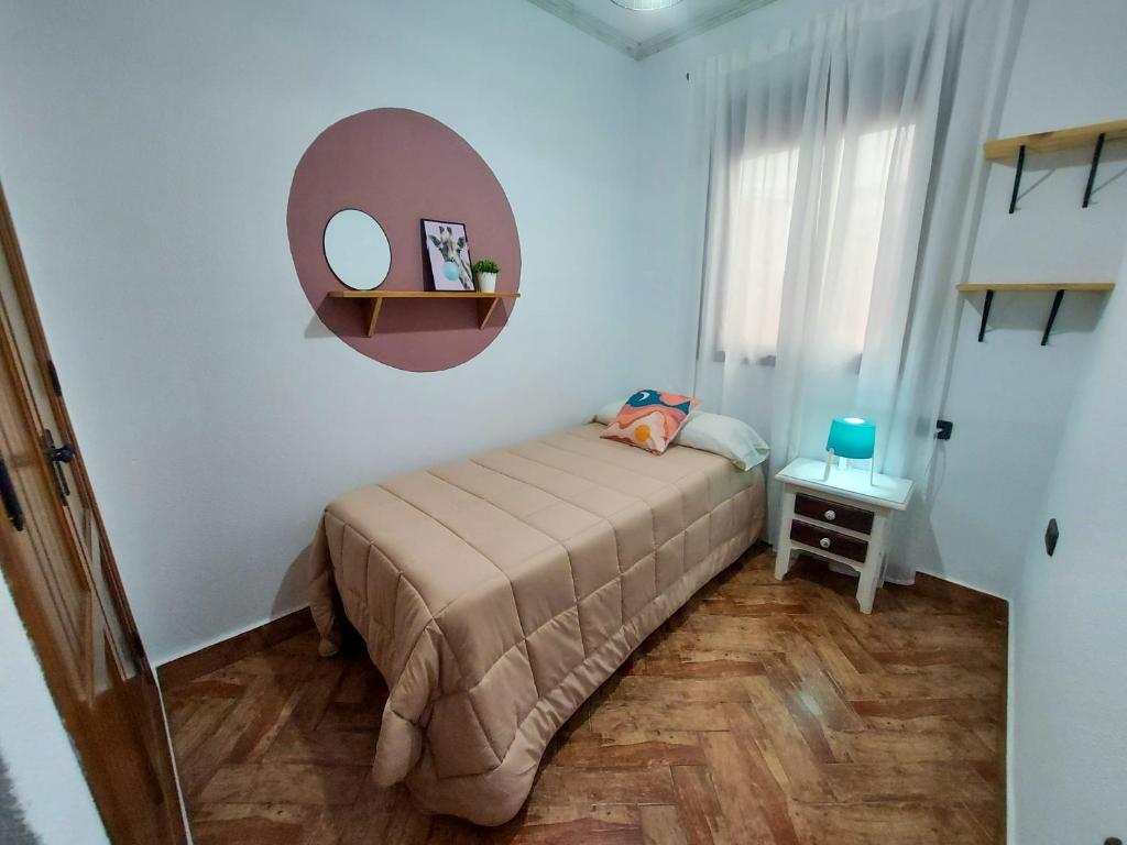 Posteľ alebo postele v izbe v ubytovaní Casa Loli - solo familias y parejas
