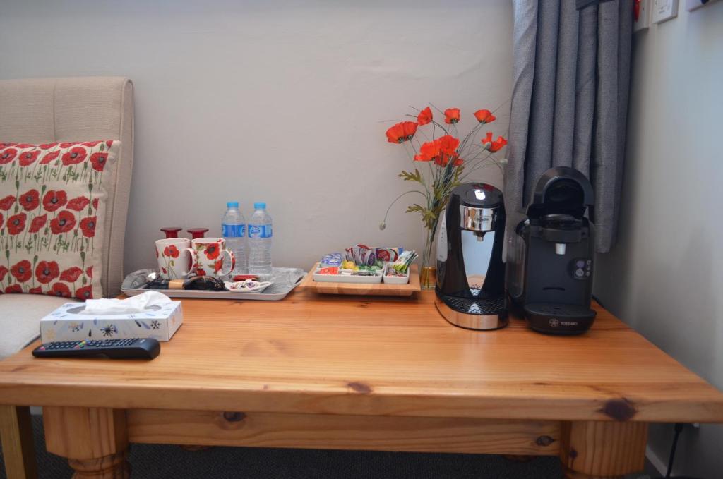 Příslušenství pro přípravu čaje a kávy v ubytování Foy House