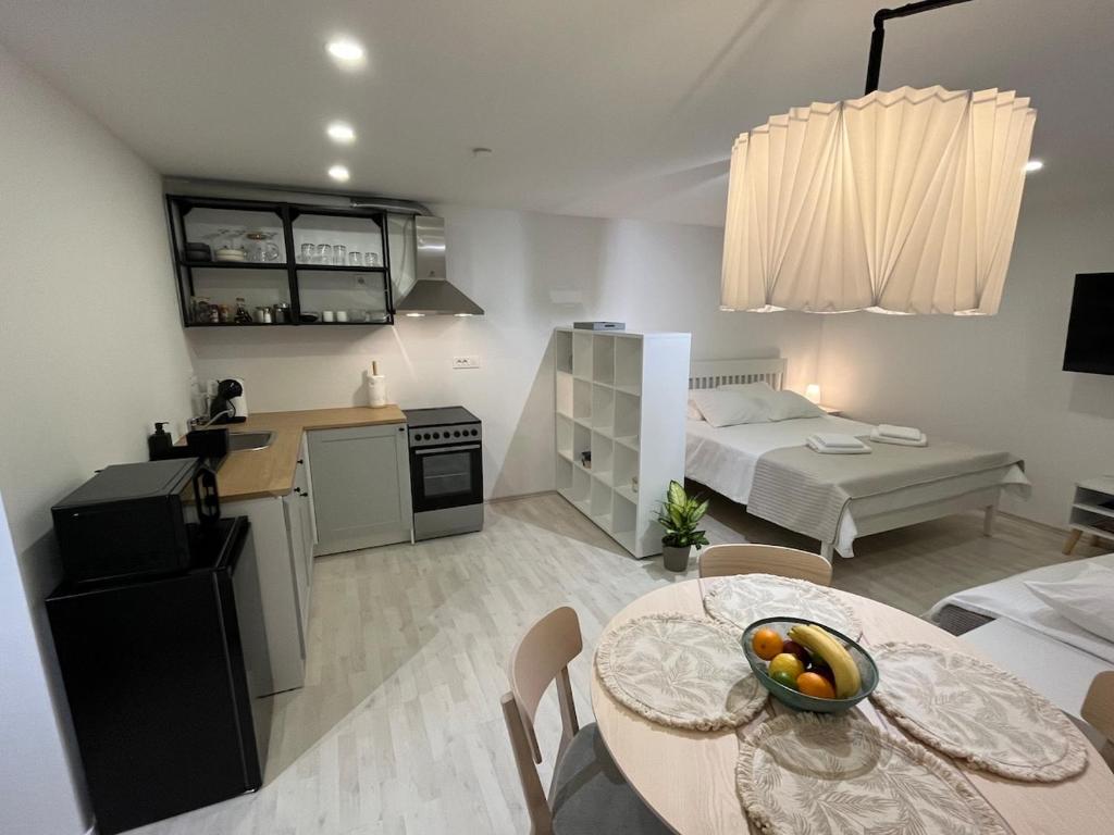 Η κουζίνα ή μικρή κουζίνα στο NEW MARI - Cozy Studio Apartment with parking