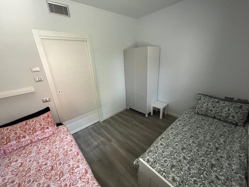 Postel nebo postele na pokoji v ubytování Casa Darcellas trilocale in a4 con giardino