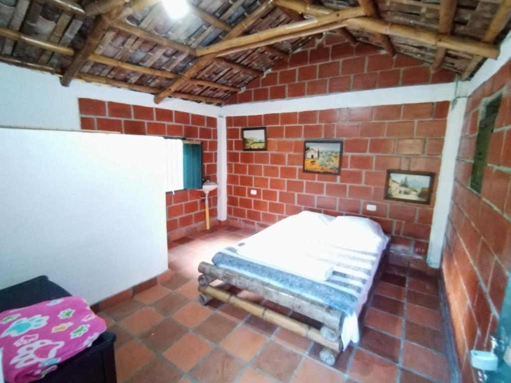 Postel nebo postele na pokoji v ubytování Casa de Rishiva
