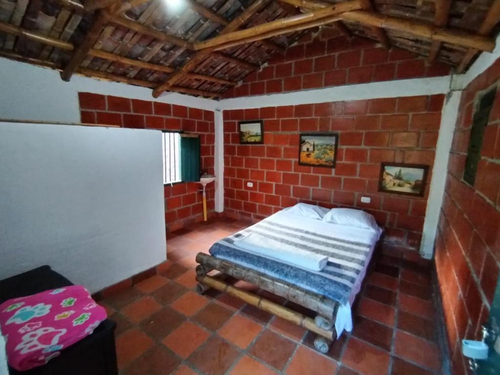Postel nebo postele na pokoji v ubytování Casa de Rishiva