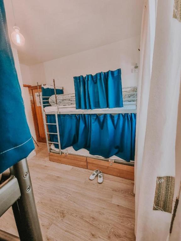 Postel nebo postele na pokoji v ubytování Aguere Nest Hostel