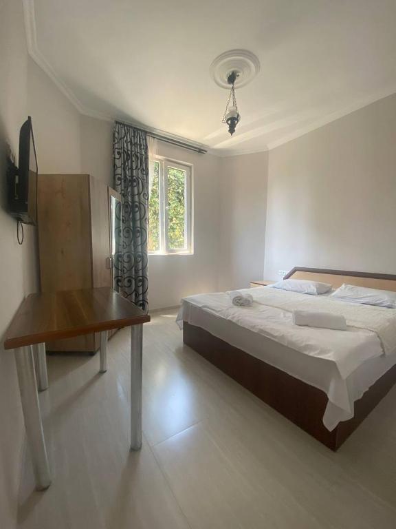 Postel nebo postele na pokoji v ubytování Guest House Deme