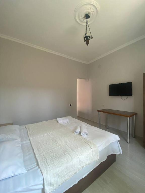 Postel nebo postele na pokoji v ubytování Guest House Deme