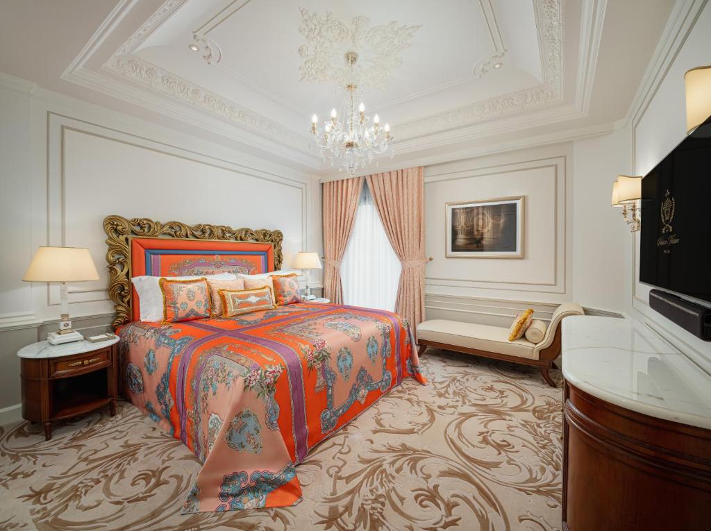 Postel nebo postele na pokoji v ubytování Palazzo Versace Macau
