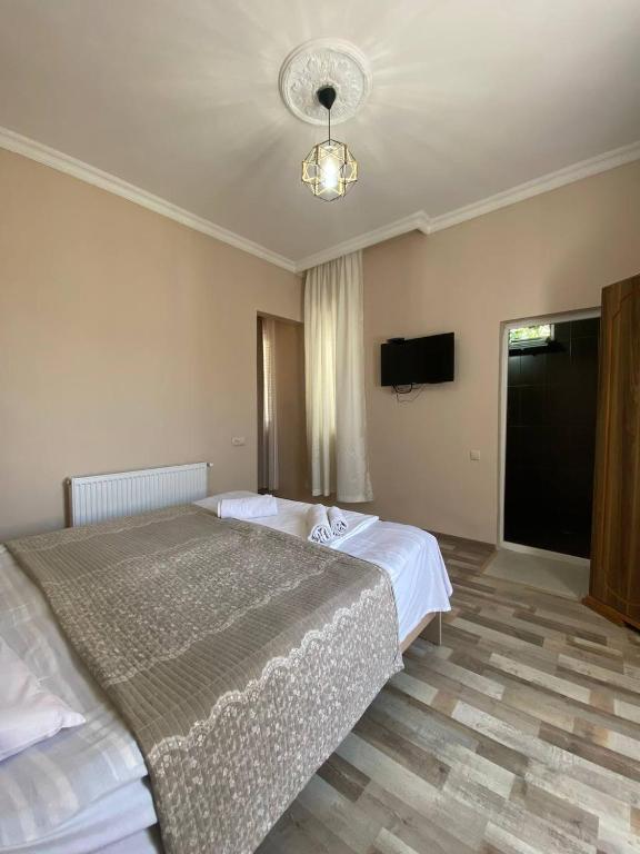 Postel nebo postele na pokoji v ubytování Guest House Deme