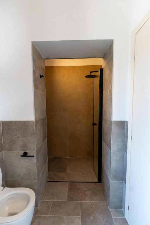 Koupelna v ubytování 4 Elementi Relais B&B Lonato del Garda