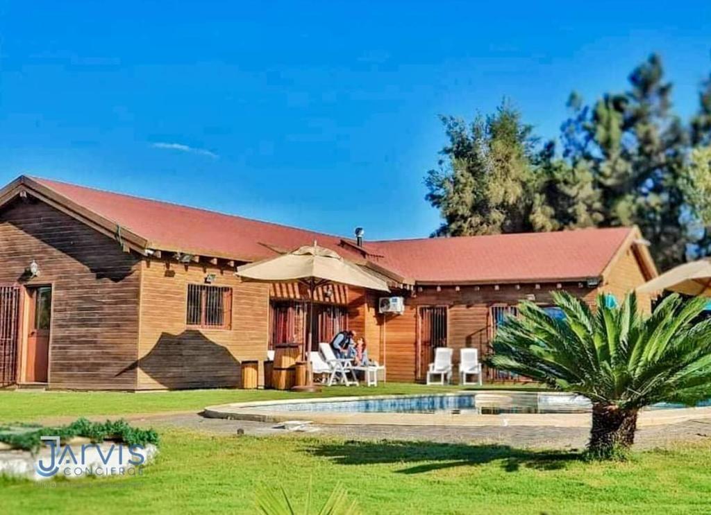 Zahrada ubytování Essanya Chalet with a private pool - Country side of nabeul