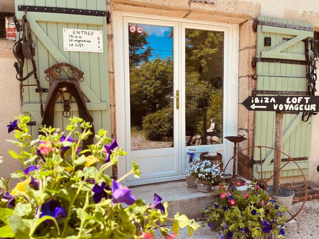 Zahrada ubytování Gîte "Le Voyageur"