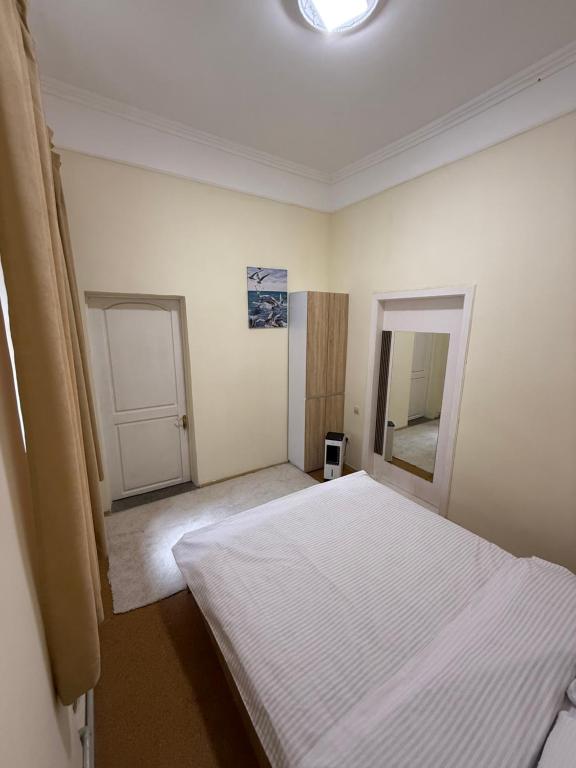 Postel nebo postele na pokoji v ubytování Green Palace